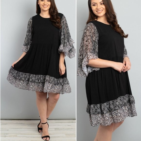 Trend Setter Diva Boutique Dresses & Skirts - Leopard trim black dress